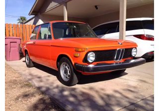 Illustration for article titled How To Stay Classy In A BMW 2002 Without Breaking The Bank